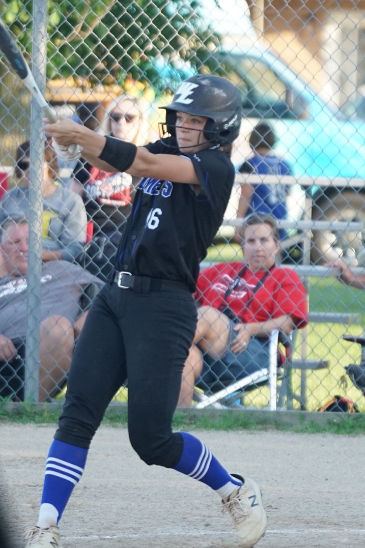 Finley Hall hits the ball while at bat during the same game