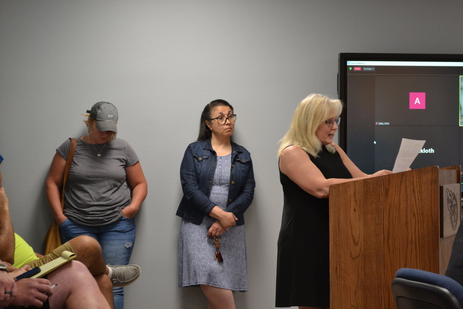 Lisa Behnke, a member of the West Liberty Advocacy Group for Public Education, read a statement to the board of education Monday, July 18, during the meeting about material the group found to be pornographic and obscene available in the school district's libraries.